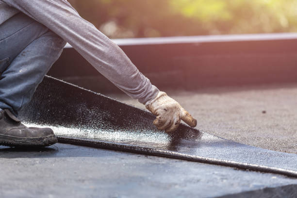 Professional Basement Waterproofing technician working in Fall River, WI